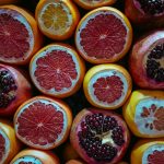 a group of oranges with different colors